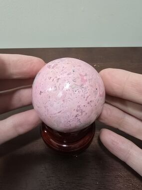 Pink Rhodonite Crystal Sphere 54 mm